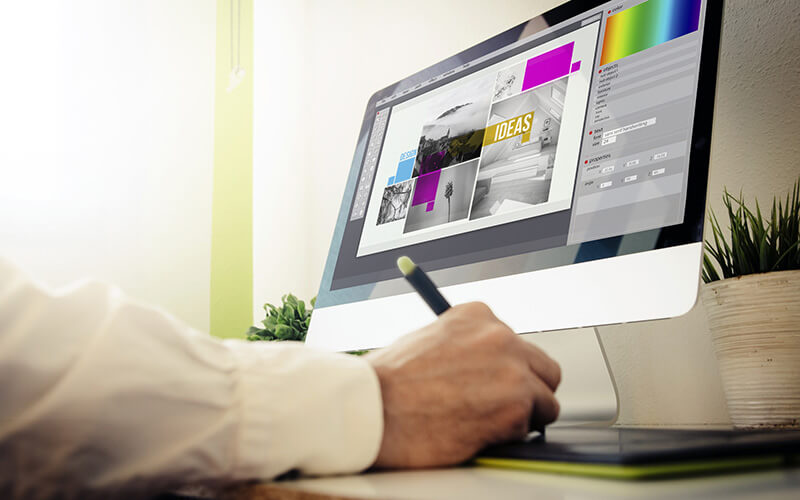 A Designer Using A Computer